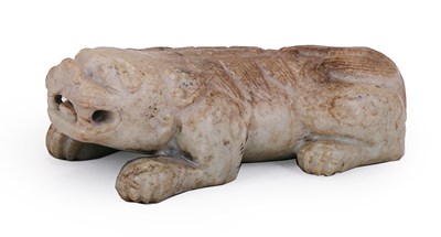 Lot 58 - A CHINESE JADE MODEL OF A BUDDHIST LION, MING