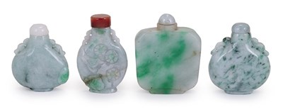 Lot 62 - A GROUP OF FOUR CHINESE JADEITE SNUFF BOTTLES AND COVERS