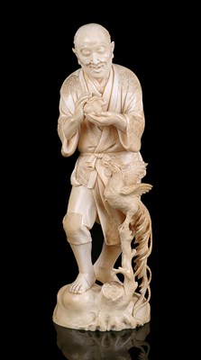 Lot 73 - A JAPANESE IVORY OKIMONO OF A MAN HOLDING A RABBIT, MEIJI