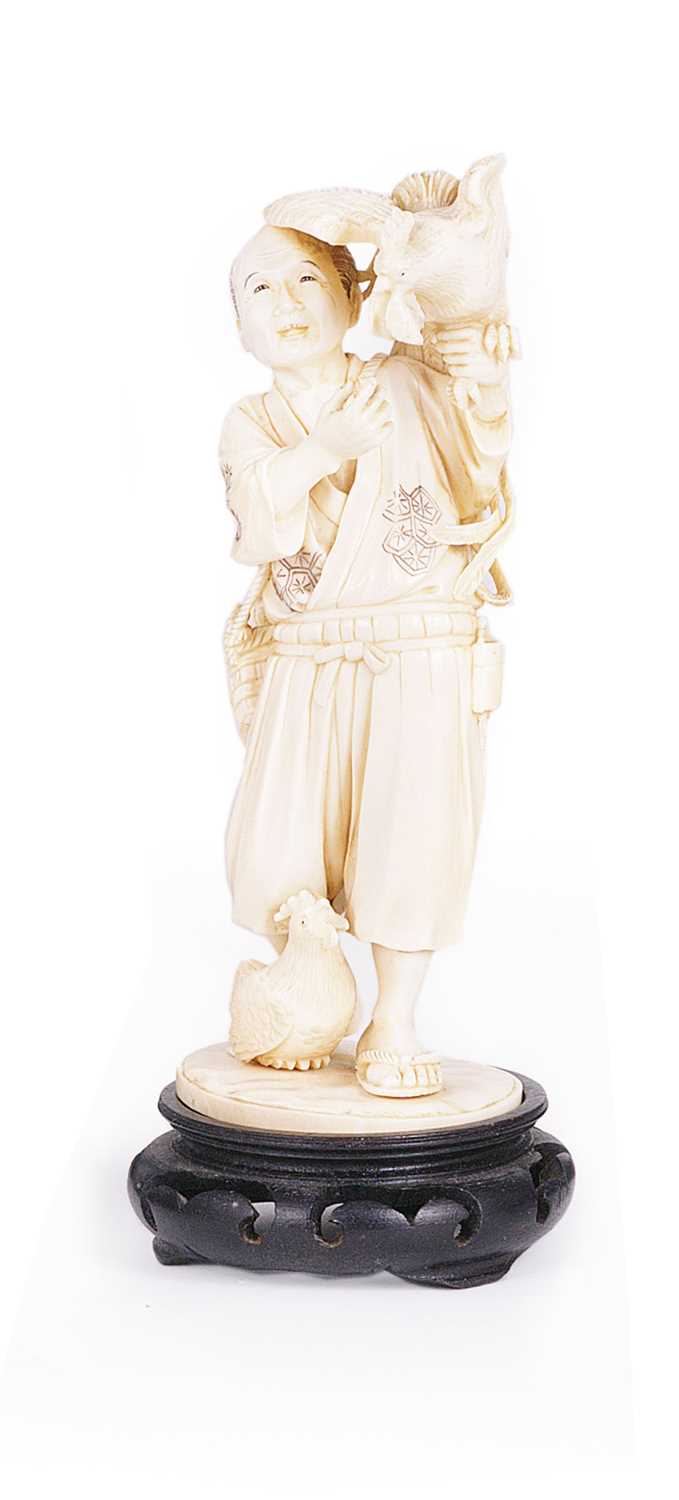 Lot 76 - A JAPANESE IVORY OKIMONO, MEIJI