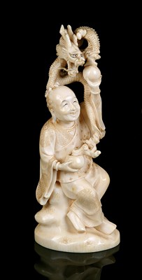 Lot 77 - A JAPANESE IVORY OKIMONO OF HANDARA SONJA, MEIJI