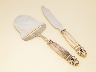 Lot 139 - A DANISH CHEESE KNIFE AND CHEESE SLICE