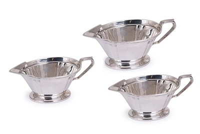 Lot 150 - A SET OF THREE ART DECO SILVER SAUCEBOATS