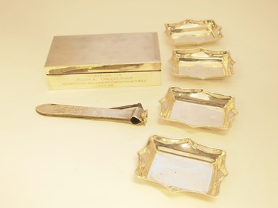 Lot 195 - A SET OF FOUR GEORGE V SILVER COUNTER TRAYS