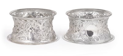 Lot 203 - A PAIR OF EDWARDIAN SILVER DISH RINGS