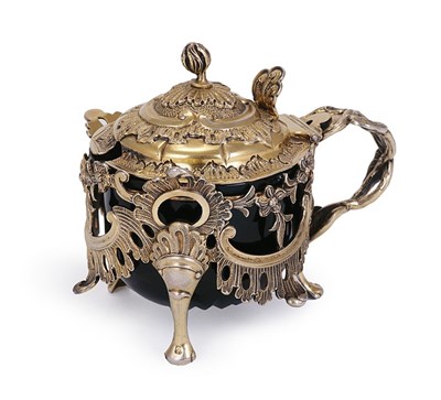 Lot 235 - A VICTORIAN SILVER-GILT MUSTARD POT