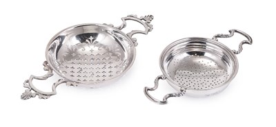 Lot 278 - A GEORGE II SILVER LEMON STRAINER