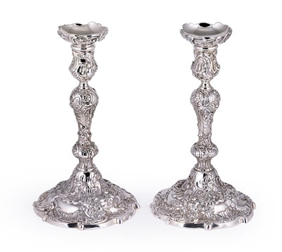 Lot 292 - A PAIR OF GEORGE II SILVER ROCOCO CANDLESTICKS