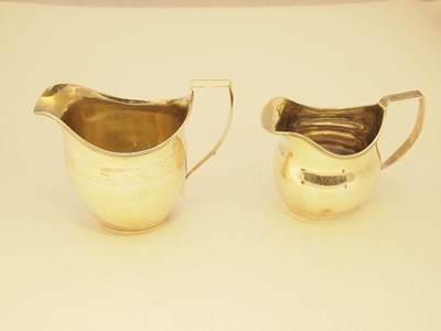 Lot 304 - A GEORGE III SILVER MILK JUG