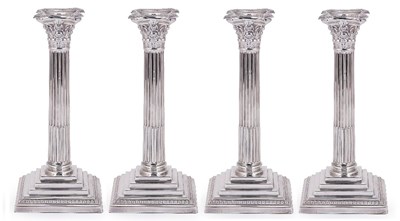 Lot 318 - A SET OF FOUR SILVER CANDLESTICKS