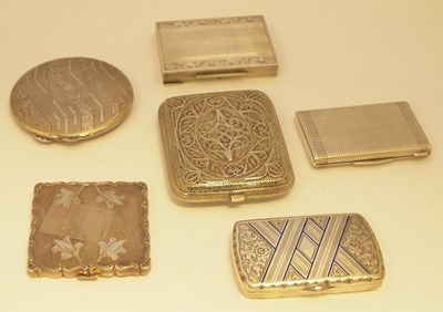 Lot 349 - SIX SILVER COMPACTS OR CIGARETTE CASES