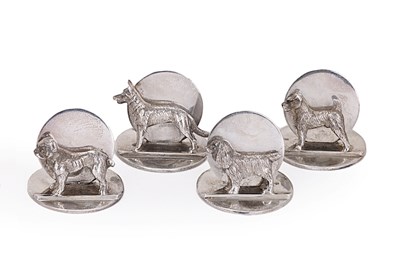 Lot 357 - A SET OF FOUR GEORGE V SILVER 'DOG' CARD HOLDERS