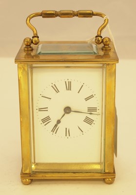 Lot 396 - A FRENCH LACQUERED BRASS CARRIAGE TIMEPIECE