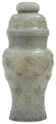 Lot 38 - A CHINESE MUGHAL-STYLE GREYISH-CELADON JADE 'LOTUS' VASE AND COVER