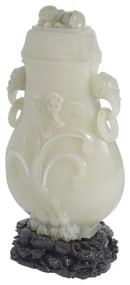 Lot 41 - A CHINESE CELADON JADE PEAR-SHAPED VASE AND COVER