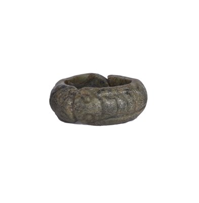 Lot 50 - A CHINESE ARCHAISTIC JADE SPLIT RING