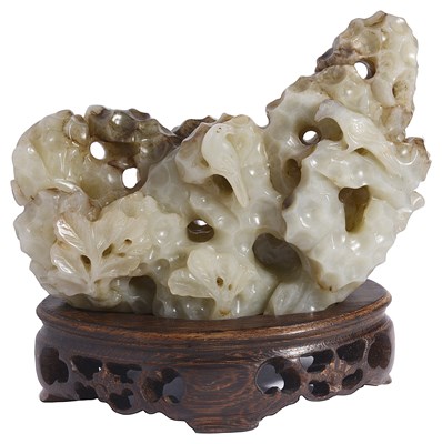 Lot 79 - A CHINESE GREY JADE ROCKWORK BRUSH REST