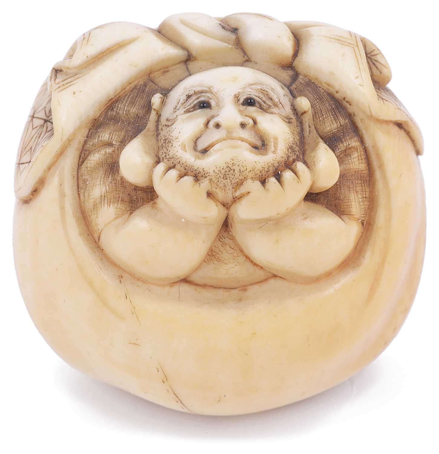 Lot 130 - ~LIGHTLY STAINED IVORY NETSUKE OF THE LUCKY GOD HOTEI IN HIS SACK