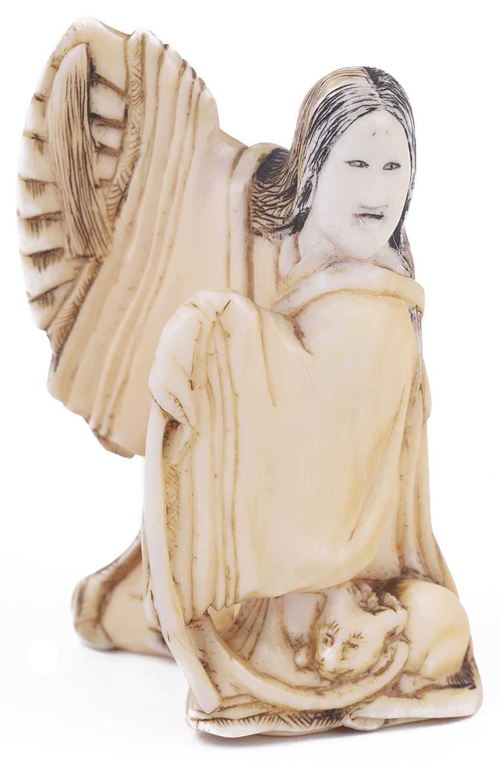 Lot 145 - ~IVORY NETSUKE OF A WOMAN WITH A CAT