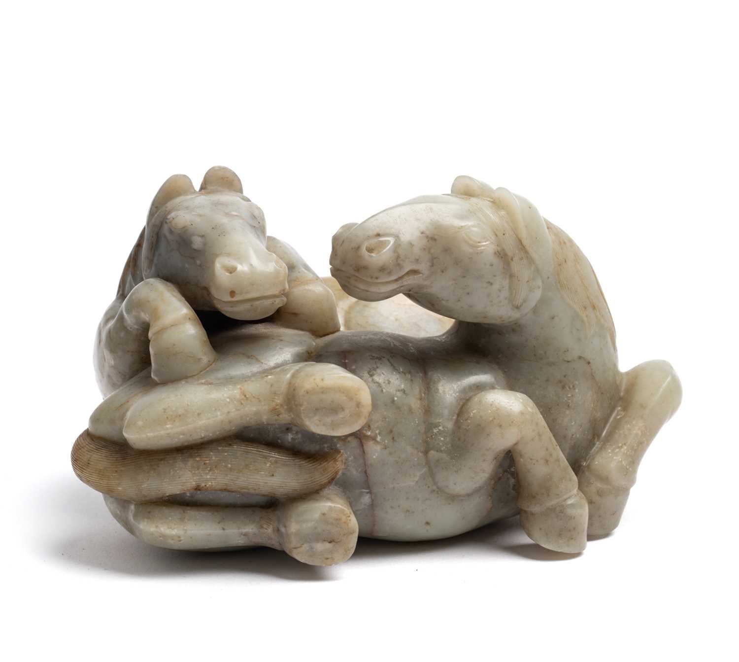 Lot 52 - A LARGE CHINESE CELADON JADE 'HORSE' GROUP, LATE QING DYNASTY (1644-1911)