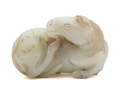 Lot 59 - A CHINESE CELADON JADE HORSE, QING DYNASTY (1644-1911)