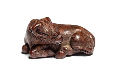 Lot 112 - TWO JAPANESE CARVED WOOD NETSUKE OF A WATER BUFFALO AND A RAM, MEIJI PERIOD (1868-1912)