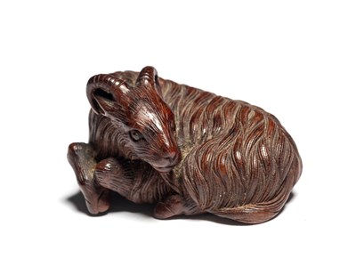 Lot 112 - TWO JAPANESE CARVED WOOD NETSUKE OF A WATER BUFFALO AND A RAM, MEIJI PERIOD (1868-1912)