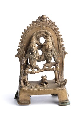 Lot 571 - A FOLK BRONZE SHRINE DEPICTING SIVA AND PARVATI, CENTRAL INDIA, 18TH/19TH CENTURY