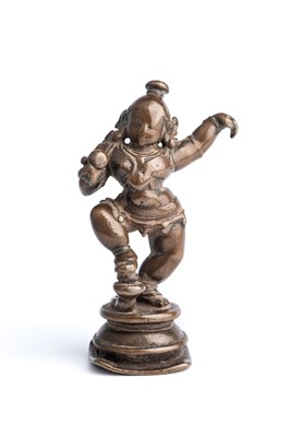 Lot 576 - A BRONZE DANCING  FIGURE OF KRISHNA, TAMIL NADU, SOUTH INDIA, CIRCA 18TH CENTURY