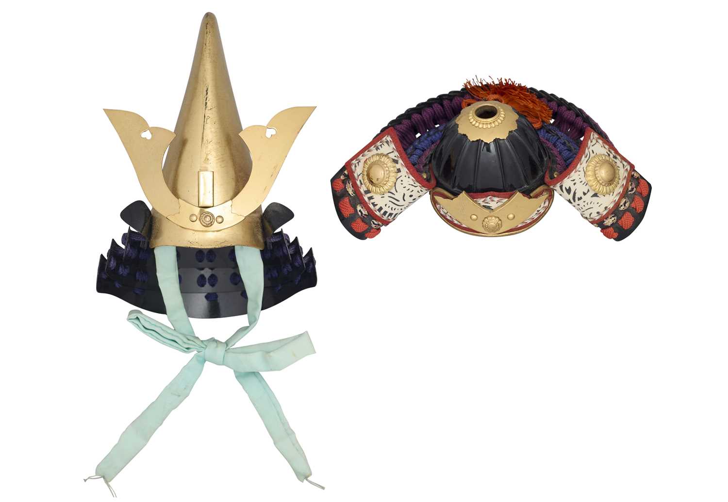 Lot 19 - TWO MINIATURE JAPANESE HELMETS, 20TH CENTURY