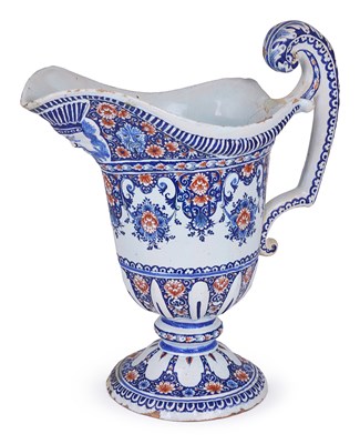 Lot 14 - A GOOD ROUEN FAIENCE HELMET-SHAPED JUG