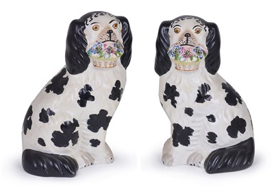 Lot 18 - A PAIR OF STAFFORDSHIRE POTTERY 'DISRAELI' SPANIELS