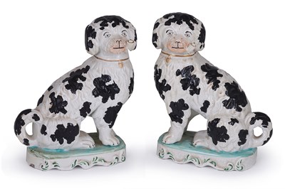 Lot 19 - A PAIR OF STAFFORDSHIRE POTTERY SPANIELS