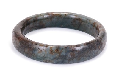 Lot 64 - A CHINESE JADE BANGLE