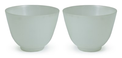 Lot 65 - â€¡A PAIR OF WHITE JADE WINE CUPS