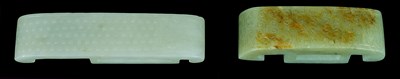 Lot 72 - TWO CHINESE JADE BELT SLIDES