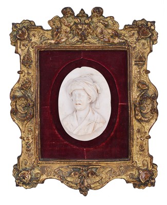 Lot 109 - A CARVED ALABASTER HIGH-RELIEF OVAL OF A TURK