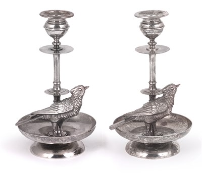 Lot 188 - A PAIR OF ELECTROPLATE CANDLESTICKS