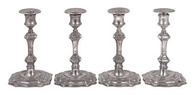 Lot 202 - A SET OF FOUR SILVER CANDLESTICKS