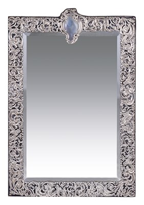 Lot 228 - AN EDWARDIAN SILVER-MOUNTED DRESSING TABLE MIRROR