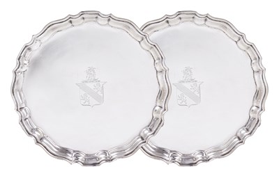 Lot 235 - A PAIR OF EDWARDIAN SILVER WAITERS