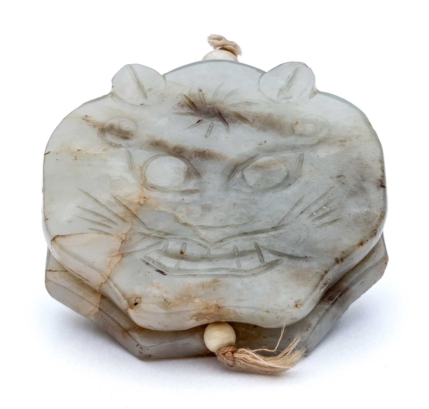 Lot 54 - A CHINESE CELADON JADE 'EIGHT TRIGRAMS' PENDANT, QING DYNASTY, 19TH CENTURY