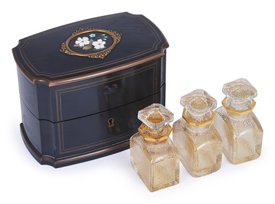Lot 323 - A NAPOLEON III BRASS-BOUND EBONISED WOOD SCENT BOTTLE CASKET