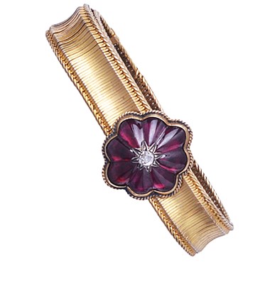 Lot 352 - GOLD AND GARNET JARRITIERE BRACELET