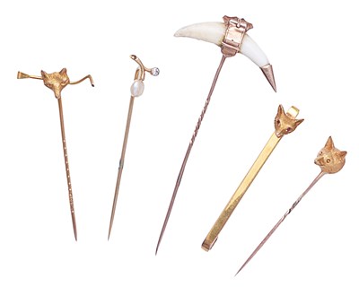 Lot 357 - FOUR GOLD STICK PINS AND A BAR CLIP