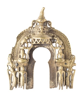 Lot 565 - A FRAGMENT FROM A JAIN SILVER INLAID BRASS SHRINE, GUJARAT, WESTERN INDIA, CIRCA 16TH CENTURY