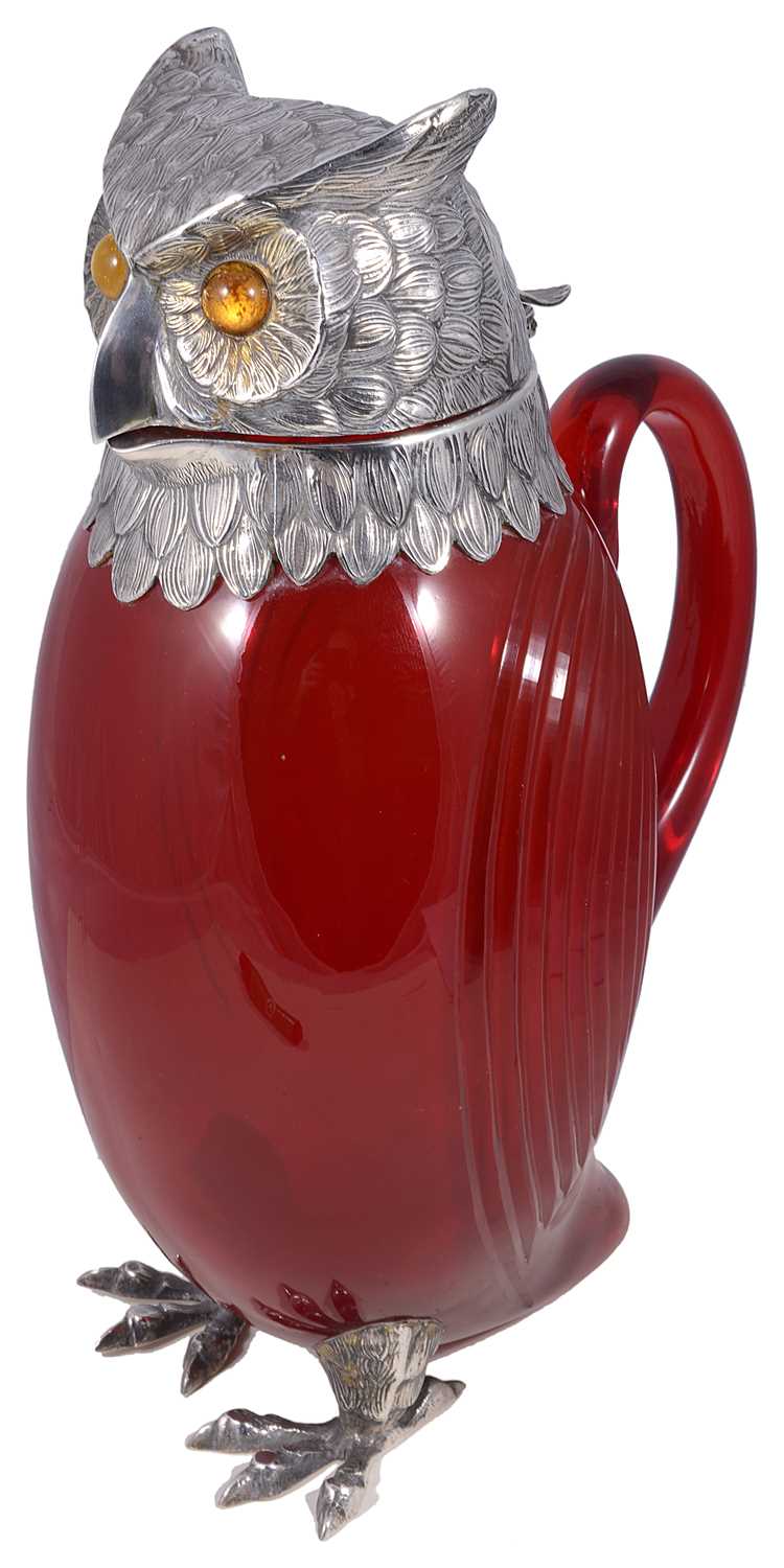 Lot 350 - A SPANISH SILVER-MOUNTED GLASS 'OWL' CLARET JUG