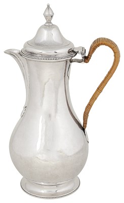 Lot 458 - A GEORGE III SILVER HOT WATER JUG
