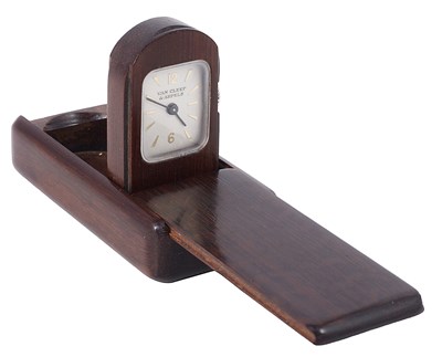 Lot 544 - A WOOD 'DOMINO' TRAVEL CLOCK