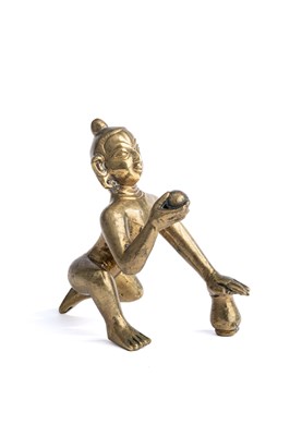 Lot 601 - A BRONZE FIGURE OF BALAKRISHNA, BENGAL, EASTERN INDIA, 19TH CENTURY